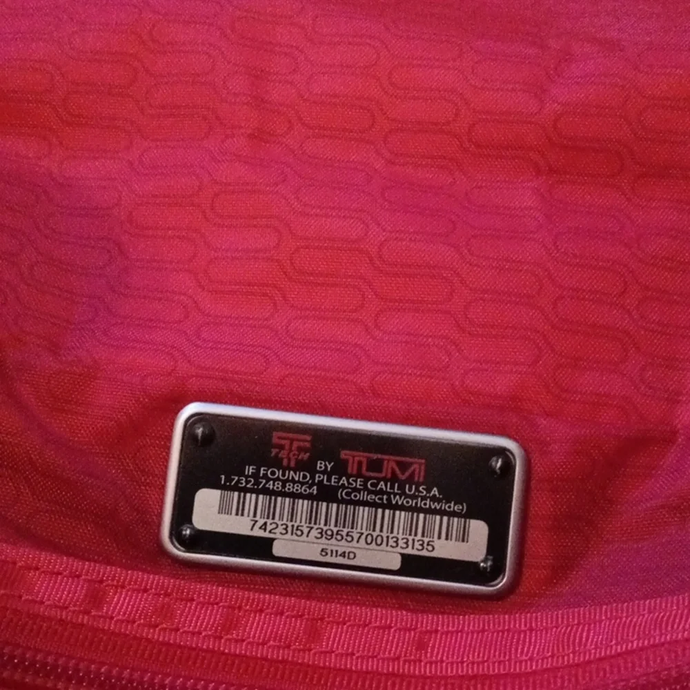 Tumi Black Laptop Messenger Bag.